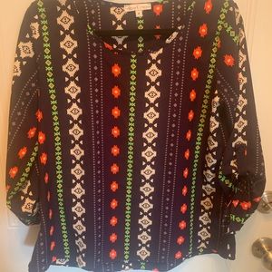 Cute blouse. Roll 3/4 sleeves. Wash & wear. No wrinkles :)